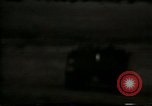 Image of Soldiers ready rifles during siege at wounded knee Wounded Knee South Dakota USA, 1973, second 23 stock footage video 65675026666