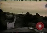 Image of Soldiers ready rifles during siege at wounded knee Wounded Knee South Dakota USA, 1973, second 31 stock footage video 65675026666