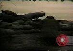Image of Soldiers ready rifles during siege at wounded knee Wounded Knee South Dakota USA, 1973, second 34 stock footage video 65675026666