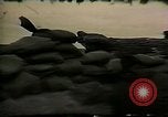 Image of Soldiers ready rifles during siege at wounded knee Wounded Knee South Dakota USA, 1973, second 36 stock footage video 65675026666