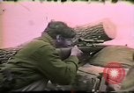 Image of Soldiers ready rifles during siege at wounded knee Wounded Knee South Dakota USA, 1973, second 43 stock footage video 65675026666