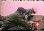 Image of Soldiers ready rifles during siege at wounded knee Wounded Knee South Dakota USA, 1973, second 44 stock footage video 65675026666