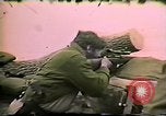 Image of Soldiers ready rifles during siege at wounded knee Wounded Knee South Dakota USA, 1973, second 45 stock footage video 65675026666