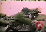 Image of Soldiers ready rifles during siege at wounded knee Wounded Knee South Dakota USA, 1973, second 46 stock footage video 65675026666
