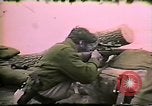 Image of Soldiers ready rifles during siege at wounded knee Wounded Knee South Dakota USA, 1973, second 47 stock footage video 65675026666