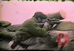 Image of Soldiers ready rifles during siege at wounded knee Wounded Knee South Dakota USA, 1973, second 48 stock footage video 65675026666