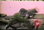 Image of Soldiers ready rifles during siege at wounded knee Wounded Knee South Dakota USA, 1973, second 49 stock footage video 65675026666