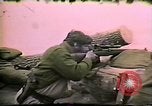 Image of Soldiers ready rifles during siege at wounded knee Wounded Knee South Dakota USA, 1973, second 50 stock footage video 65675026666