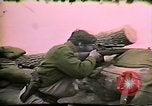 Image of Soldiers ready rifles during siege at wounded knee Wounded Knee South Dakota USA, 1973, second 51 stock footage video 65675026666