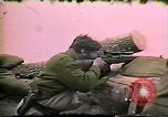 Image of Soldiers ready rifles during siege at wounded knee Wounded Knee South Dakota USA, 1973, second 53 stock footage video 65675026666
