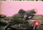 Image of Soldiers ready rifles during siege at wounded knee Wounded Knee South Dakota USA, 1973, second 54 stock footage video 65675026666