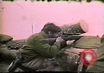 Image of Soldiers ready rifles during siege at wounded knee Wounded Knee South Dakota USA, 1973, second 55 stock footage video 65675026666