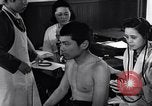 Image Peuple japonais Japon, 1952, de la seconde 19 séquences d'archives historiques vidéo 65675026678