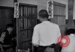 Image Peuple japonais Japon, 1952, de la seconde 21 séquences d'archives historiques vidéo 65675026679
