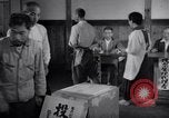 Image Peuple japonais Japon, 1952, de la seconde 29 séquences d'archives historiques vidéo 65675026679