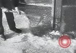 Image of snow covered city Netherlands, 1941, second 13 stock footage video 65675026788