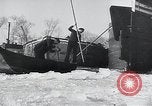 Image of snow covered city Netherlands, 1941, second 17 stock footage video 65675026788