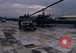 Standbild Dr Seamans Inspektion UH-1H Flugzeuge Rüstung Binh Thuy AFB Vietnam, 1970, aus Sekunde 15 historischem Filmmaterial Videoclip 65675026833