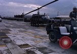 Standbild Dr Seamans Inspektion UH-1H Flugzeuge Rüstung Binh Thuy AFB Vietnam, 1970, aus Sekunde 18 historischem Filmmaterial Videoclip 65675026833