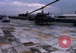Standbild Dr Seamans Inspektion UH-1H Flugzeuge Rüstung Binh Thuy AFB Vietnam, 1970, aus Sekunde 21 historischem Filmmaterial Videoclip 65675026833