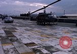 Standbild Dr Seamans Inspektion UH-1H Flugzeuge Rüstung Binh Thuy AFB Vietnam, 1970, aus Sekunde 22 historischem Filmmaterial Videoclip 65675026833