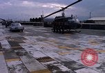 Standbild Dr Seamans Inspektion UH-1H Flugzeuge Rüstung Binh Thuy AFB Vietnam, 1970, aus Sekunde 23 historischem Filmmaterial Videoclip 65675026833