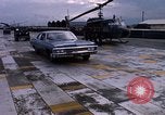 Standbild Dr Seamans Inspektion UH-1H Flugzeuge Rüstung Binh Thuy AFB Vietnam, 1970, aus Sekunde 27 historischem Filmmaterial Videoclip 65675026833