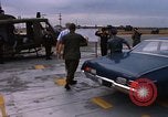 Standbild Dr Seamans Inspektion UH-1H Flugzeuge Rüstung Binh Thuy AFB Vietnam, 1970, aus Sekunde 41 historischem Filmmaterial Videoclip 65675026833