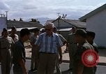 Immagine di Dr Seamans ispezionando la formazione delle strutture scolastiche Nha Trang Air Base Vietnam, 1970, secondo 12 filmato di repertorio 65675026839