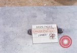Image of Soldier cleaning his rifle during Operation Somerset Plain Vietnam, 1968, second 7 stock footage video 65675026843
