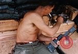 Image of Soldier cleaning his rifle during Operation Somerset Plain Vietnam, 1968, second 40 stock footage video 65675026843
