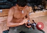 Image of Soldier cleaning his rifle during Operation Somerset Plain Vietnam, 1968, second 42 stock footage video 65675026843