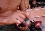 Image of Soldier cleaning his rifle during Operation Somerset Plain Vietnam, 1968, second 45 stock footage video 65675026843