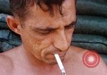 Image of Soldier cleaning his rifle during Operation Somerset Plain Vietnam, 1968, second 54 stock footage video 65675026843