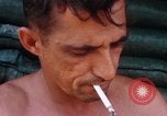 Image of Soldier cleaning his rifle during Operation Somerset Plain Vietnam, 1968, second 56 stock footage video 65675026843
