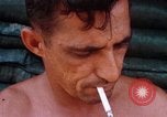 Image of Soldier cleaning his rifle during Operation Somerset Plain Vietnam, 1968, second 58 stock footage video 65675026843