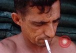 Image of Soldier cleaning his rifle during Operation Somerset Plain Vietnam, 1968, second 59 stock footage video 65675026843