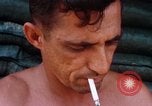 Image of Soldier cleaning his rifle during Operation Somerset Plain Vietnam, 1968, second 60 stock footage video 65675026843