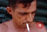 Image of Soldier cleaning his rifle during Operation Somerset Plain Vietnam, 1968, second 61 stock footage video 65675026843