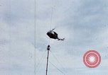 Image of Flying and landing of UH-1H helicopter during Operation Somerset Plain Vietnam, 1968, second 3 stock footage video 65675026846