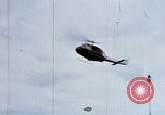Image of Flying and landing of UH-1H helicopter during Operation Somerset Plain Vietnam, 1968, second 5 stock footage video 65675026846