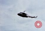 Image of Flying and landing of UH-1H helicopter during Operation Somerset Plain Vietnam, 1968, second 6 stock footage video 65675026846