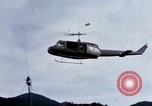 Image of Flying and landing of UH-1H helicopter during Operation Somerset Plain Vietnam, 1968, second 8 stock footage video 65675026846