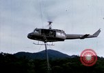 Image of Flying and landing of UH-1H helicopter during Operation Somerset Plain Vietnam, 1968, second 9 stock footage video 65675026846