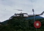 Image of Flying and landing of UH-1H helicopter during Operation Somerset Plain Vietnam, 1968, second 10 stock footage video 65675026846