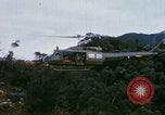 Image of Flying and landing of UH-1H helicopter during Operation Somerset Plain Vietnam, 1968, second 11 stock footage video 65675026846