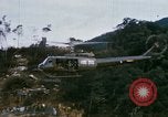 Image of Flying and landing of UH-1H helicopter during Operation Somerset Plain Vietnam, 1968, second 12 stock footage video 65675026846