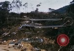 Image of Flying and landing of UH-1H helicopter during Operation Somerset Plain Vietnam, 1968, second 13 stock footage video 65675026846