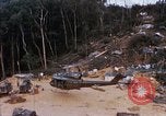 Image of Flying and landing of UH-1H helicopter during Operation Somerset Plain Vietnam, 1968, second 19 stock footage video 65675026846
