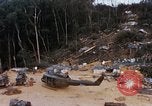 Image of Flying and landing of UH-1H helicopter during Operation Somerset Plain Vietnam, 1968, second 20 stock footage video 65675026846